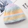 Pastel macaron gradient knit beanie hat with thick wool texture in a flat lay view - One Size / Rainbow Gradient
