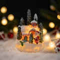LED lit miniature snow covered church with Santa Claus resin Christmas decoration - Santa Claus with Church Cottage