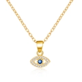 Macro view of evil eye necklace with blue gem and diamonds on gold chain - Rhinestone Style (O-Chain)