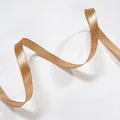 Detailed texture of champagne gold satin ribbon with elegant silky weave and glossy finish - Thin Champagne Gold (1cm Width 5m Length)