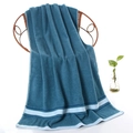 Deep teal oversized cotton bath towel with blue horizontal stripes draped on a chair - Striped Border Bath Towel (Peacock Blue) / 70*140cm