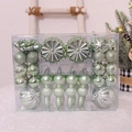 Set of light green Christmas ball ornaments with glitter and star shapes in a gift box - Emerald Green