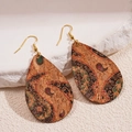 Macro detail of teardrop leather earrings with paisley patterns on stone texture - Water Drop Shape (Paisley Pattern) / Ear Hook-Brown Flower