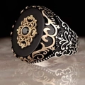 Detailed close-up of retro mens ring with black gemstone and intricate filigree patterns - Black Onyx Two-tone Hollow(KJZ029XS)