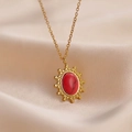 Vintage necklace with 14K gold-plated oval pendant featuring a marbled red stone inlay - Red Oval Stone Sunburst (YCN1609)