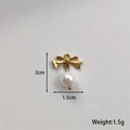 Detailed view of golden bowknot pearl pendant with dimensions 2cm height and 1.5cm width - Bow with Pearl