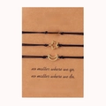Close-up of three woven friendship bracelets with sun moon and star charms on a card - Best Friend Gold Set (B00548)