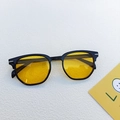 Classic retro sunglasses featuring a black frame and yellow lenses for a stylish street look - Yellow