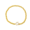 Golden beaded elastic bracelet featuring a white pet paw print pendant on a clean background - White