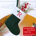 Dark green knitted Christmas stocking with white cuff and red embroidered letter R - Letter R / Dark Green