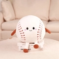 Cute baseball plush doll with red stitching details sitting on decorative books - White (Baseball Style) / 28cm