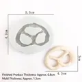 Macro detail of silicone pretzel mold with 5.5x4.7cm dimensions for DIY cake decor - Biscuit Style 3