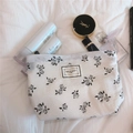 White floral quilted makeup bag with black rose patterns and Time To Party label - White Small Rose
