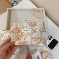 Detailed macro view of the jacquard fabric texture and simple wish label on the mini bag - Pink Gold Thread Dandelion