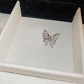 Macro detail of silver butterfly ear cuff inlaid with brilliant marquise zircons - Silver (Right Ear)