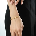 Elegant gold-tone heart chain bracelet for women featuring multi-heart linked design - Bracelet / Gold