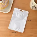 Close-up of 10.5x15cm white matte zip lock bag with hang hole on warm wood background - White