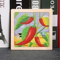 Square wooden puzzle featuring colorful cartoon red pepper and mosquito for kids - Chili