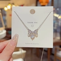 Silver bow necklace with zircon inlays and heart-shaped crystal pendant - X353 Silver Bow Heart Zirconia