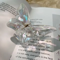 Iridescent resin butterfly hair claw clip with colorful gradient shimmer effect - Aurora White