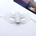 White lace masquerade mask with intricate floral cutouts and white ribbon ties for Halloween - Small Pointed - White