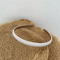 Slim white fabric headband with brown non-slip lining on a natural straw hat - White