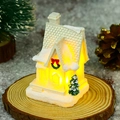 Luminous white resin Christmas village house with LED lights on a wooden display stand - Style F