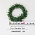 Detail of PVC pine needle wreath with 8cm inner and 12cm outer diameter specs - 8cm Green Pine Needle Ring