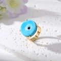 Dettaglio dell'anello malocchio con occhio in vetro blu e fascia regolabile placcata oro - Aperto Regolabile / Occhio Del Diavolo Celeste