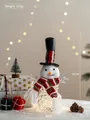 Pupazzo di neve natalizio luminoso con cappello a righe rosse e luci LED calde 33cm - 33x18cm / Pupazzo di Neve con Sciarpa a Fantasia