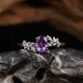 Detailed macro view of S925 silver ring featuring natural amethyst and leaf design - Leaf Inlaid Zircon Style (LR348)