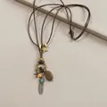 Detail shot of a bohemian tassel necklace with wooden beads and vintage charms - 2# Silver Small Feather Style