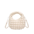 Quilted nylon dumpling bag in cream white with adjustable crossbody strap and top handle - Off White
