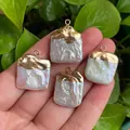 Hand holding four square baroque pearls with golden edges and natural textures - No.23 Width 16-20mm