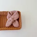 Soft pink knitted baby scarf with convenient crossover design for winter warmth - Solid Color-Pink