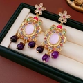 Detail of vintage gold flower earrings with pink gemstone and purple bead tassels - Multi-color (925 Sterling Silver Pin)
