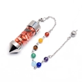 Macro view of cone-shaped crystal wishing bottle pendant with colorful chakra stone beads - Red Jasper