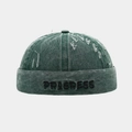 Détail du bonnet docker vert délavé avec broderie PROGRESS et trous de style vintage - Réglable / Vert Foncé