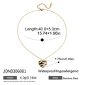 Detail of a gold heart pendant with black and white zebra pattern and zircons - Zebra Pattern Heart Necklace Style (JDN0306081)