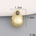 Detail view of 1.2cm x 1.6cm golden sphere bead with ring for DIY jewelry making - 12mm*16mm Round Bead / Gold