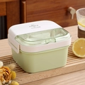 Light green double-layer bento lunch box with white lid and built-in utensil storage - Green