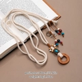 Detail of bohemian hand-woven cotton belt with wooden beads and turquoise stones - Double Strand (X492-1)