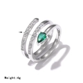 Silberner Schlangenring mit Pavé-Diamanten und einem grünen birnenförmigen Edelstein - US 6 / Platiniert - Grüner Zirkonia