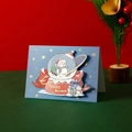 3D pop-up Christmas card in deep blue with snowman snow globe design and gold text - Snowman