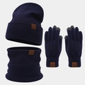 Close-up of snowflake leather labels and touch screen tips on navy knit winter set - Navy Blue