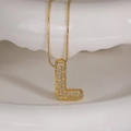 Gold letter L necklace featuring cubic zirconia pavé with a sleek box chain style - Letter L (Box Chain)