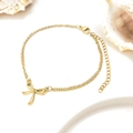 Minimalist double-layer bow bracelet in 18K gold finish on a clean white background - Gold Color Anklet
