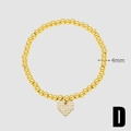 Bracelet extensible doré à billes de 4mm avec un pendentif cœur étincelant - Style D (Or Perles Coeur Bracelet Élastique)