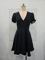 Detail of white lace trim on V-neckline and puff sleeves of a black French style dress - S / In Stock