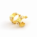Detailed view of gold hammered C-shaped earrings with white pearl flower accents - White Pearl
